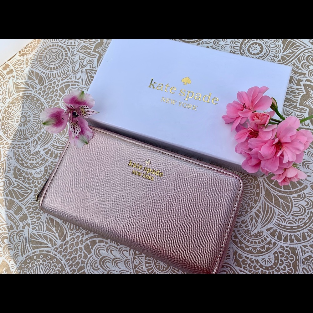 Kate spade rose gold wallet brand new with…